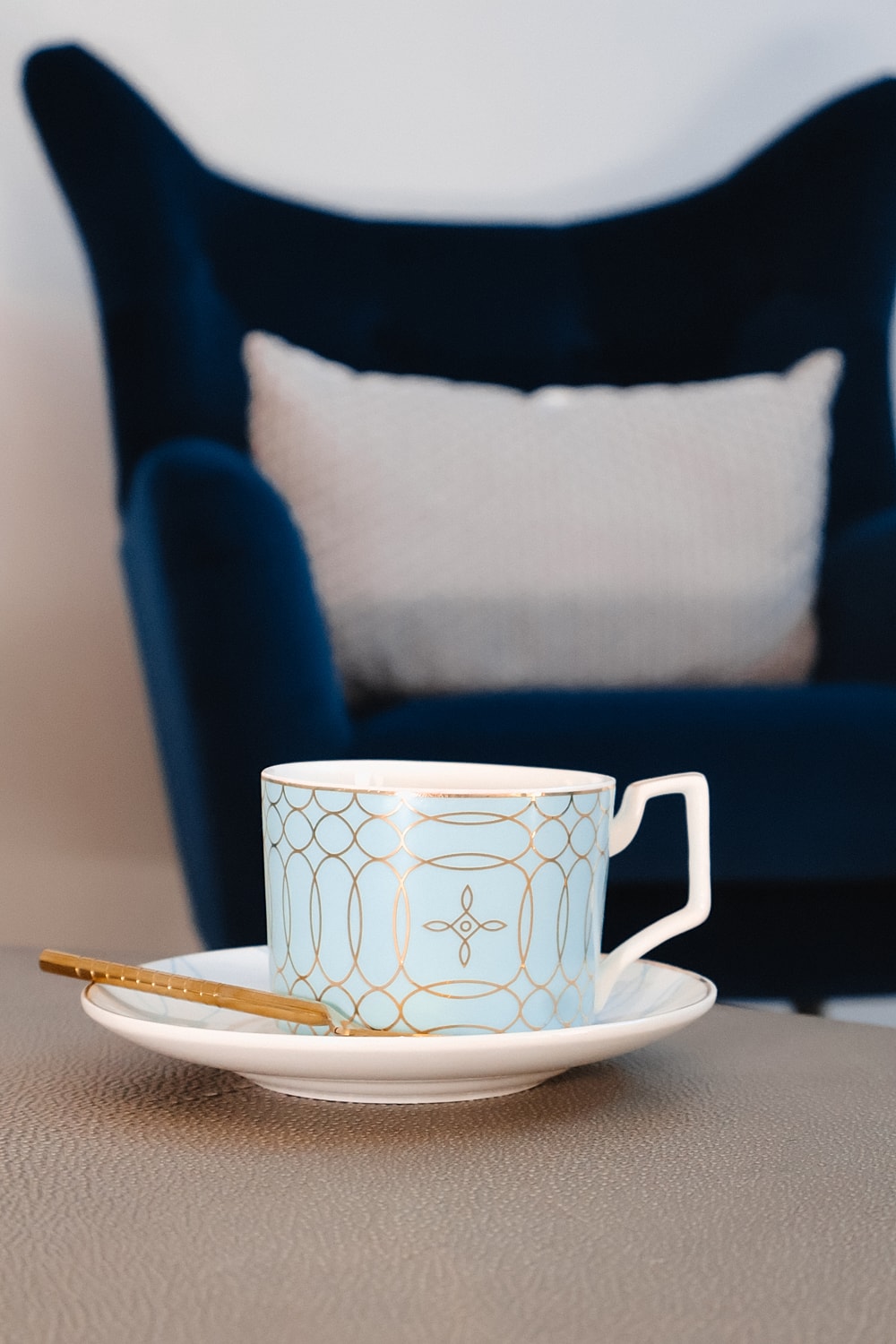 Elegant cup and saucer on a table.