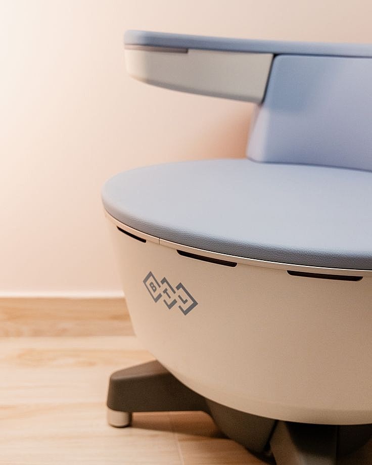 Modern ergonomic chair in a minimalist setting.