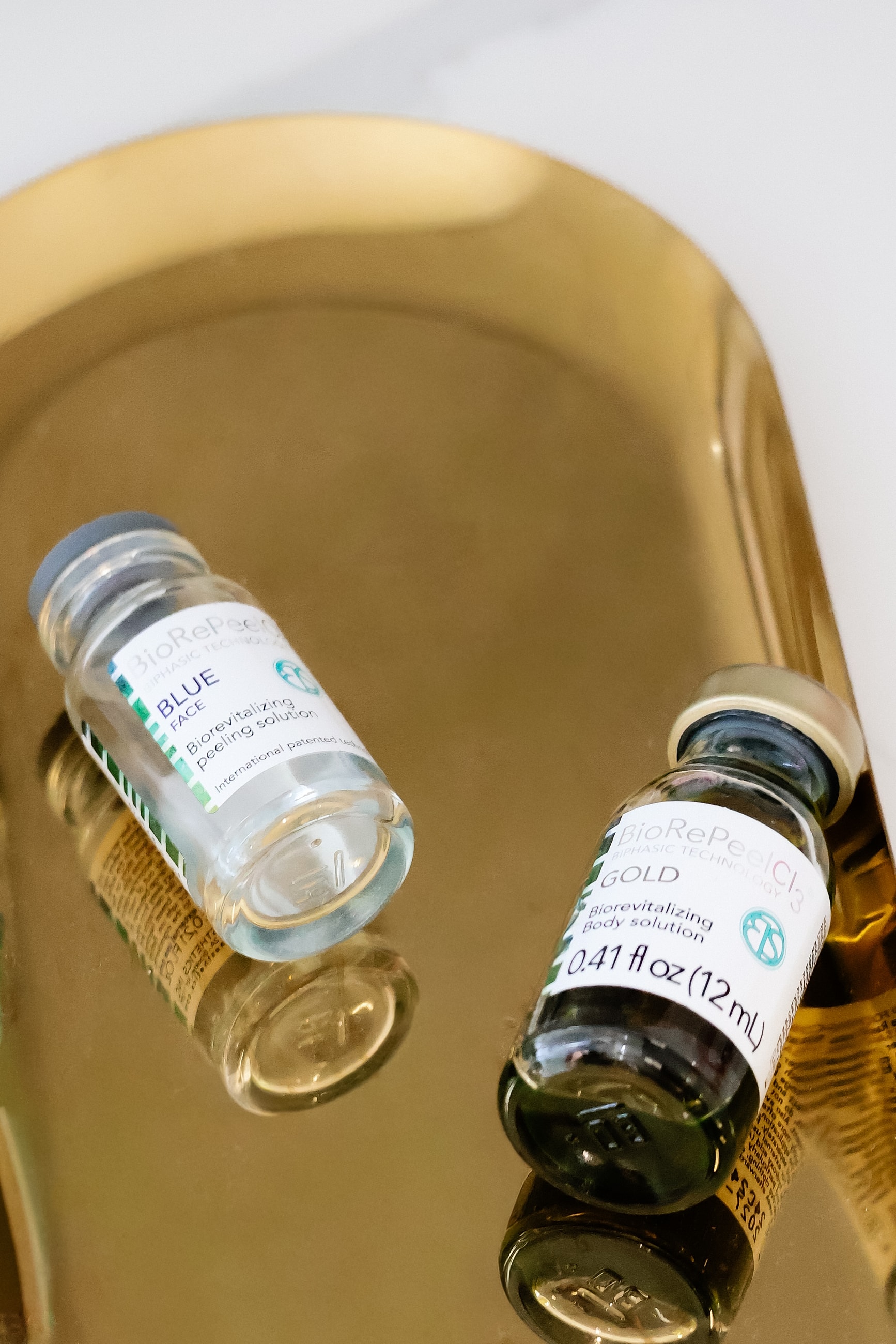 BioRePeelC3 vials on a gold tray