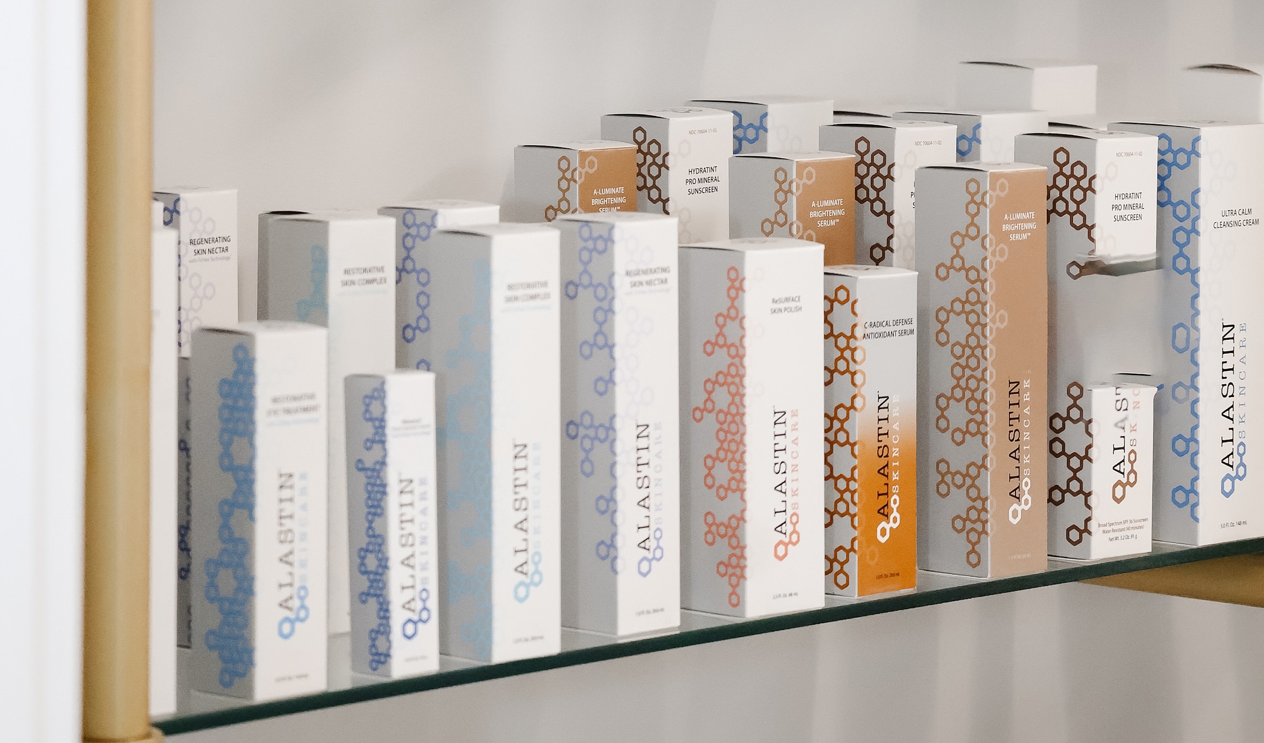 Skincare products displayed on a shelf.