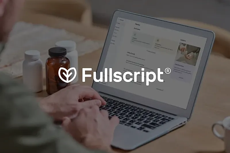 Person using Fullscript on a laptop.